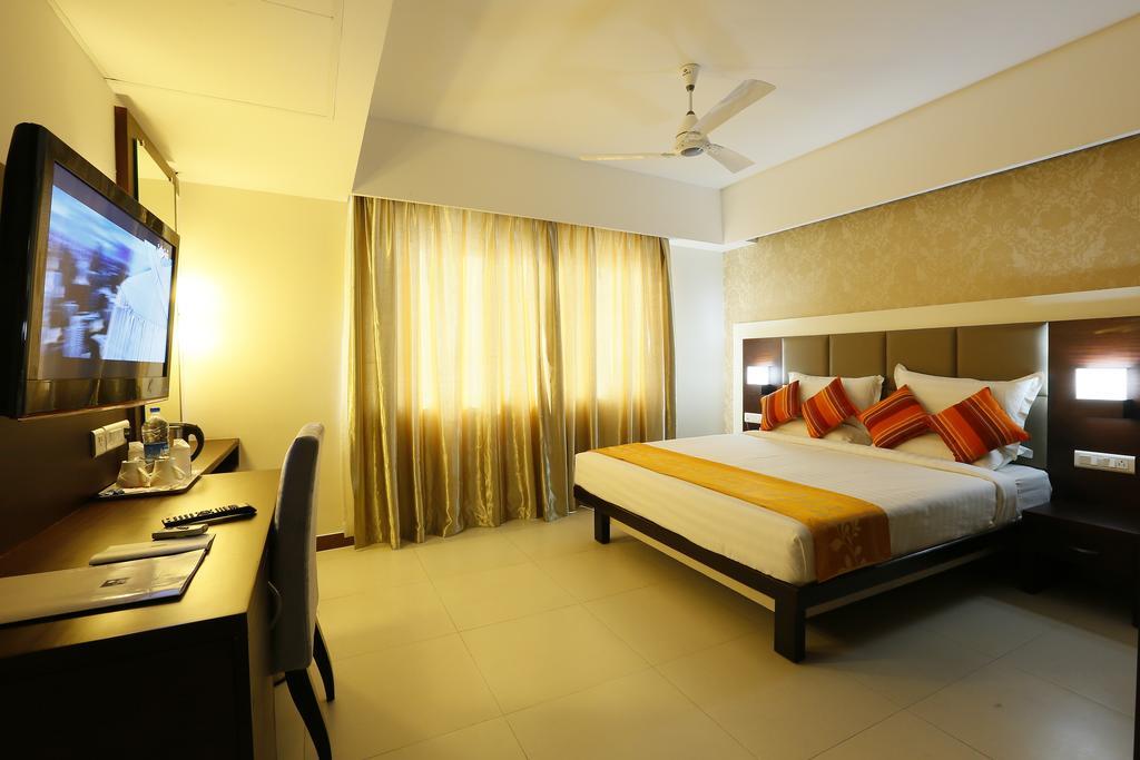 Hotel Moonlit Regency Thodupuzha Værelse billede