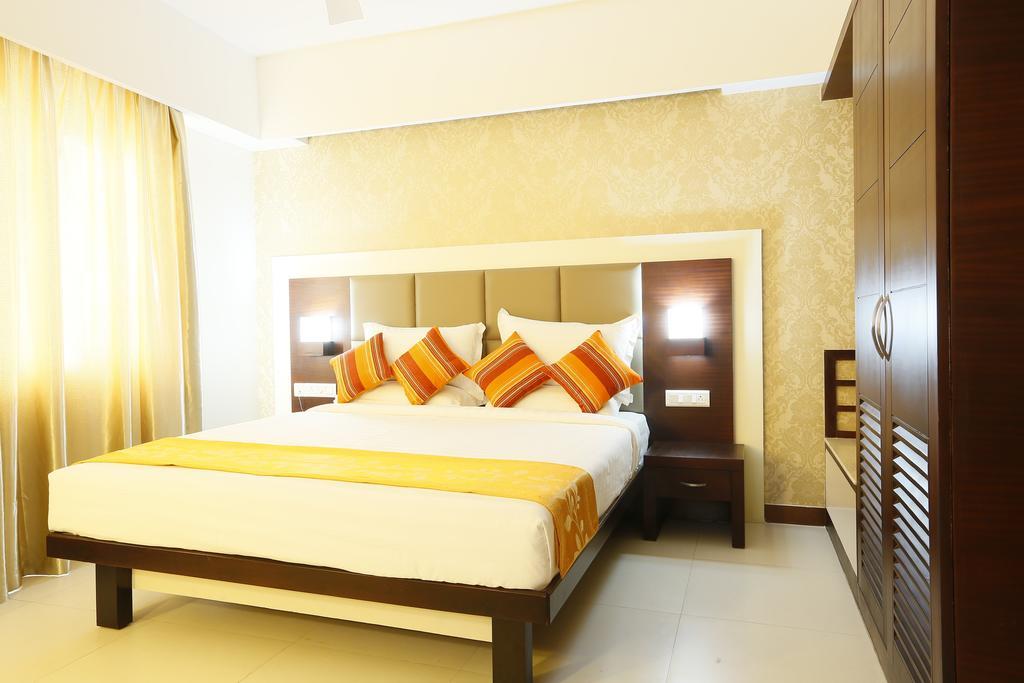 Hotel Moonlit Regency Thodupuzha Værelse billede